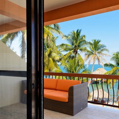 couch on balcony overlooking Caribbean