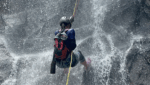 Mid way down Rappelling