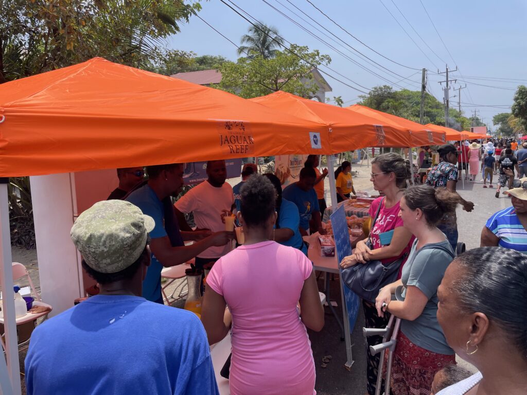 Serving drinks at Mango Fest