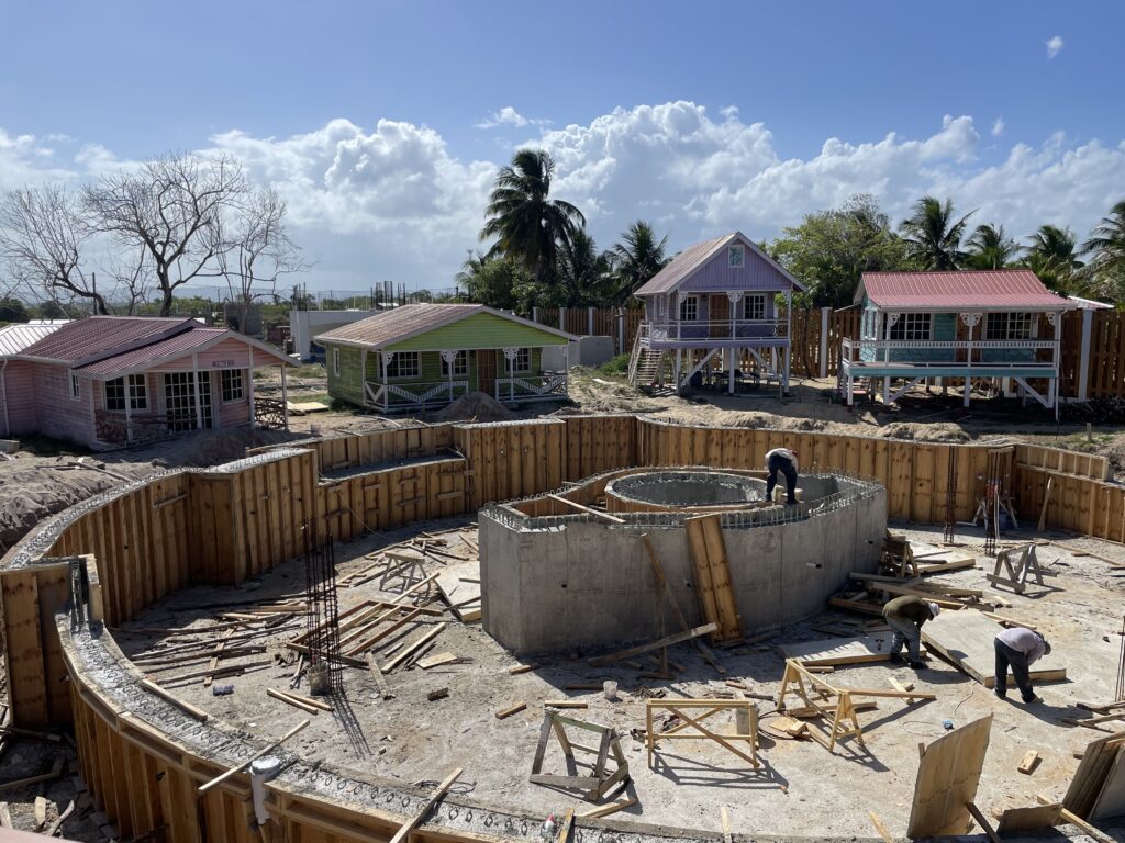 The concrete has been poured for the pool walls and center island