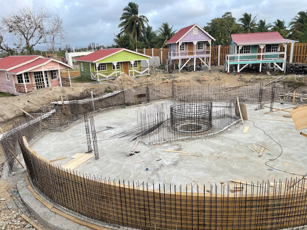 Wooden forms are built around the edge of the pool